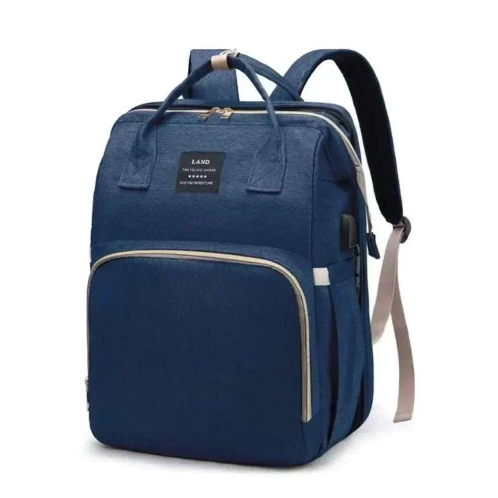 Sac à dos pratique Sac à dos pratique bleu marine en tissu, avec fermeture zippée, anses supérieures et larges bretelles rembourrées.